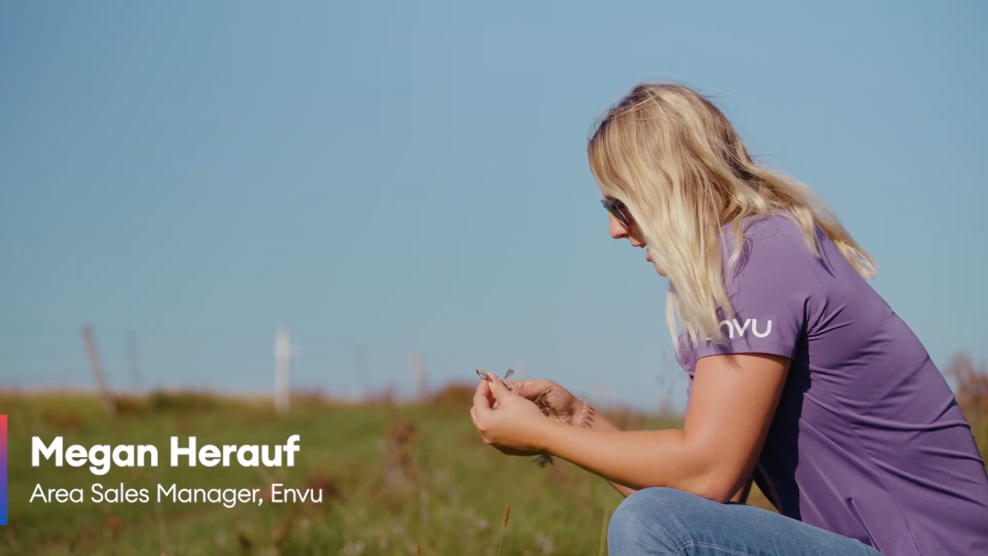 Megan Herauf, Envu Area Sales Manager, inspects a field.