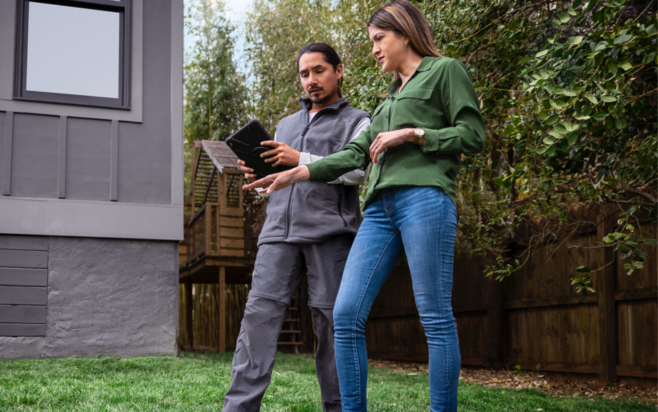 couple of people reviewing area