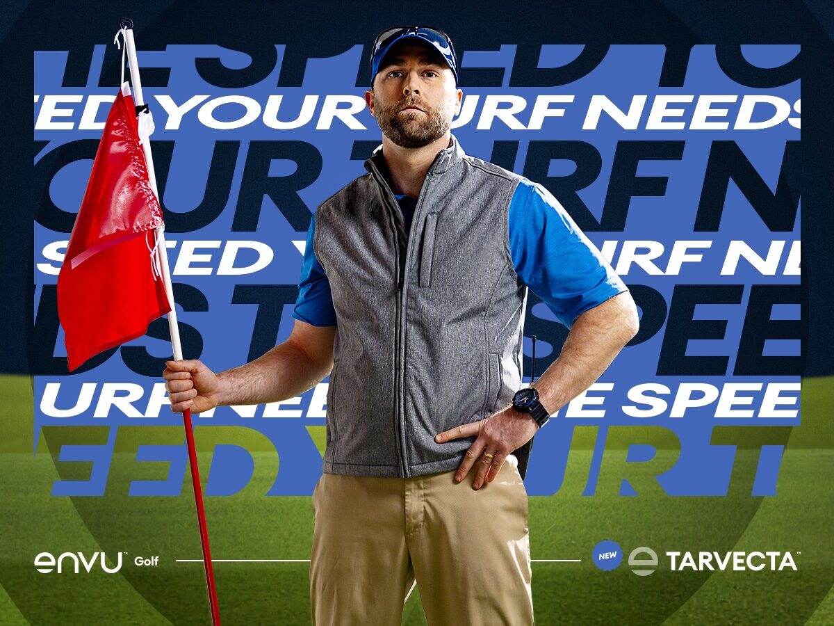 beyond your turf need man holding red golf flag