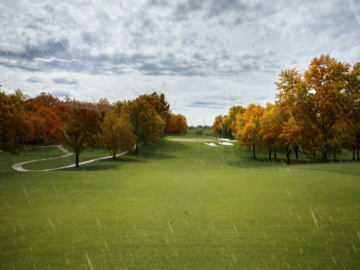 clouds over golf course fairway