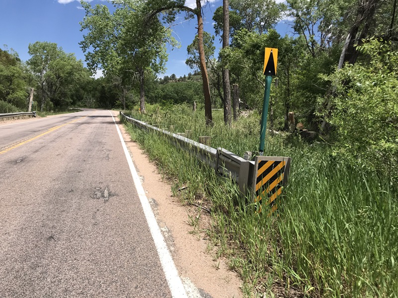 selective weeding roadside guardrail road trees