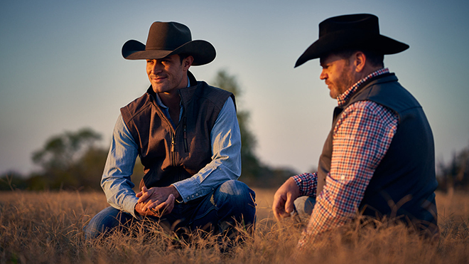 two ranchers sitting