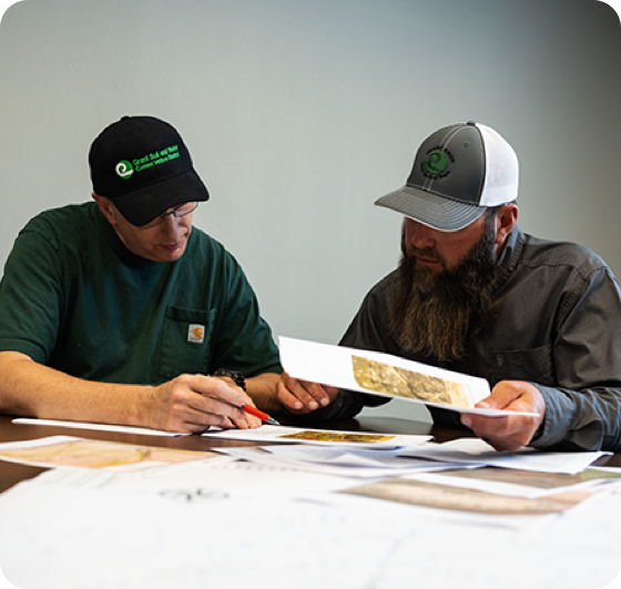 two men reviewing papers